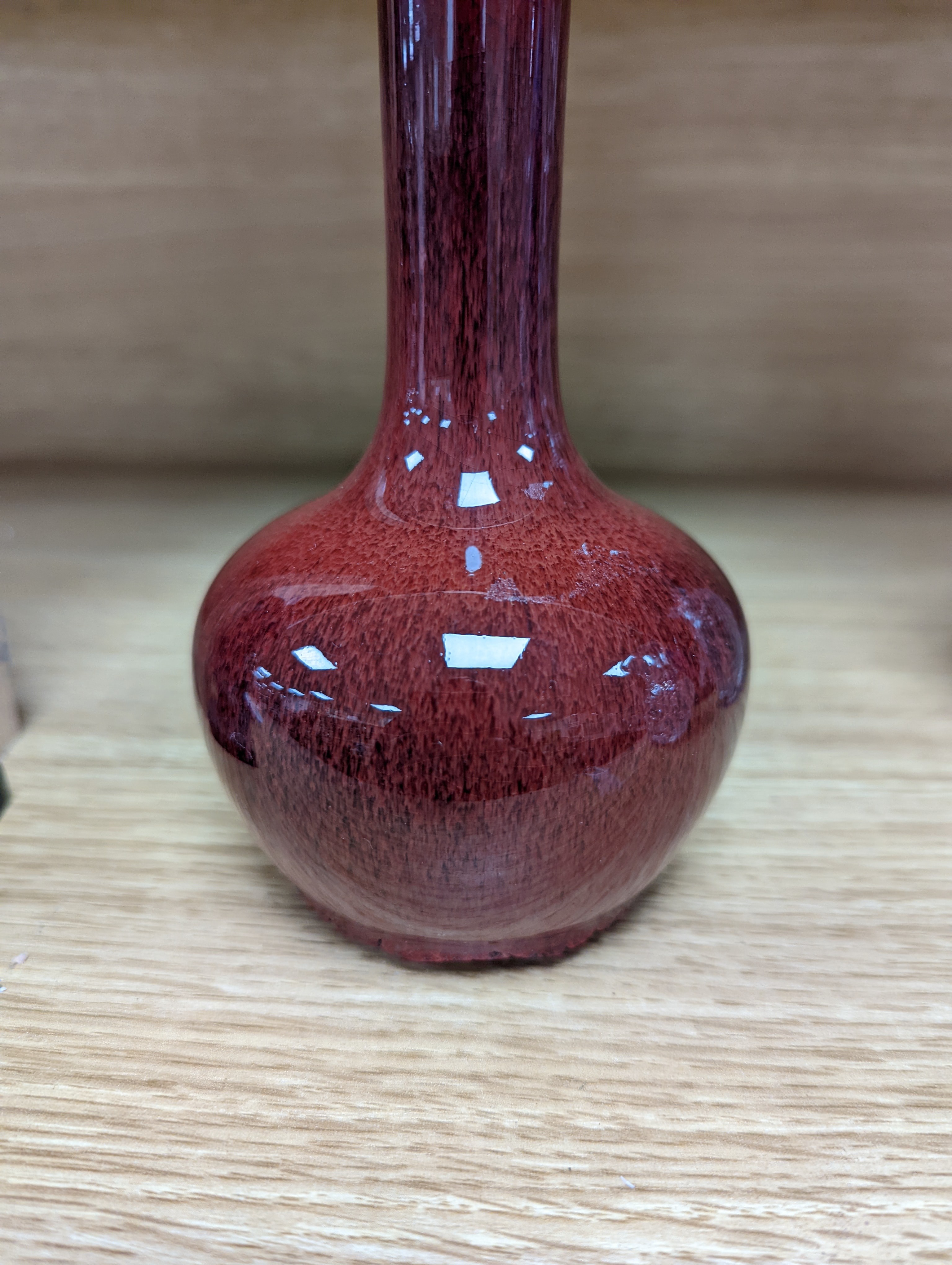 A Chinese sang de boeuf glazed vase 17cm